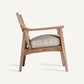 Fauteuil en tissu beige et rotin